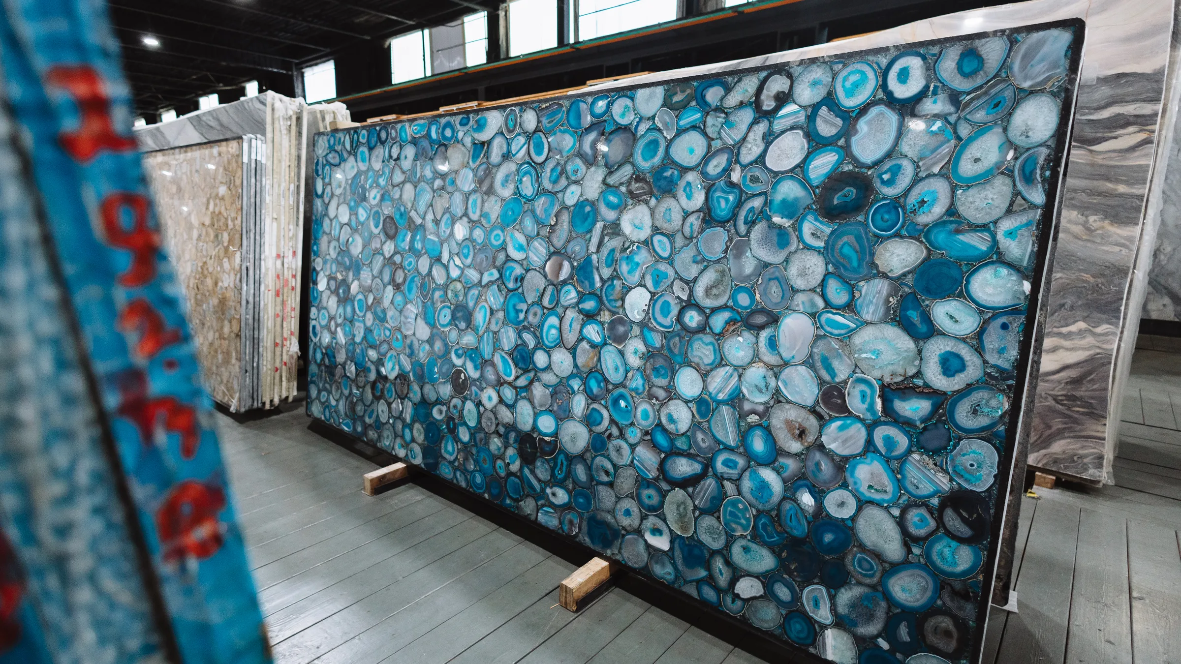 A blue agate semi-precious slab standing in the KLZ showroom